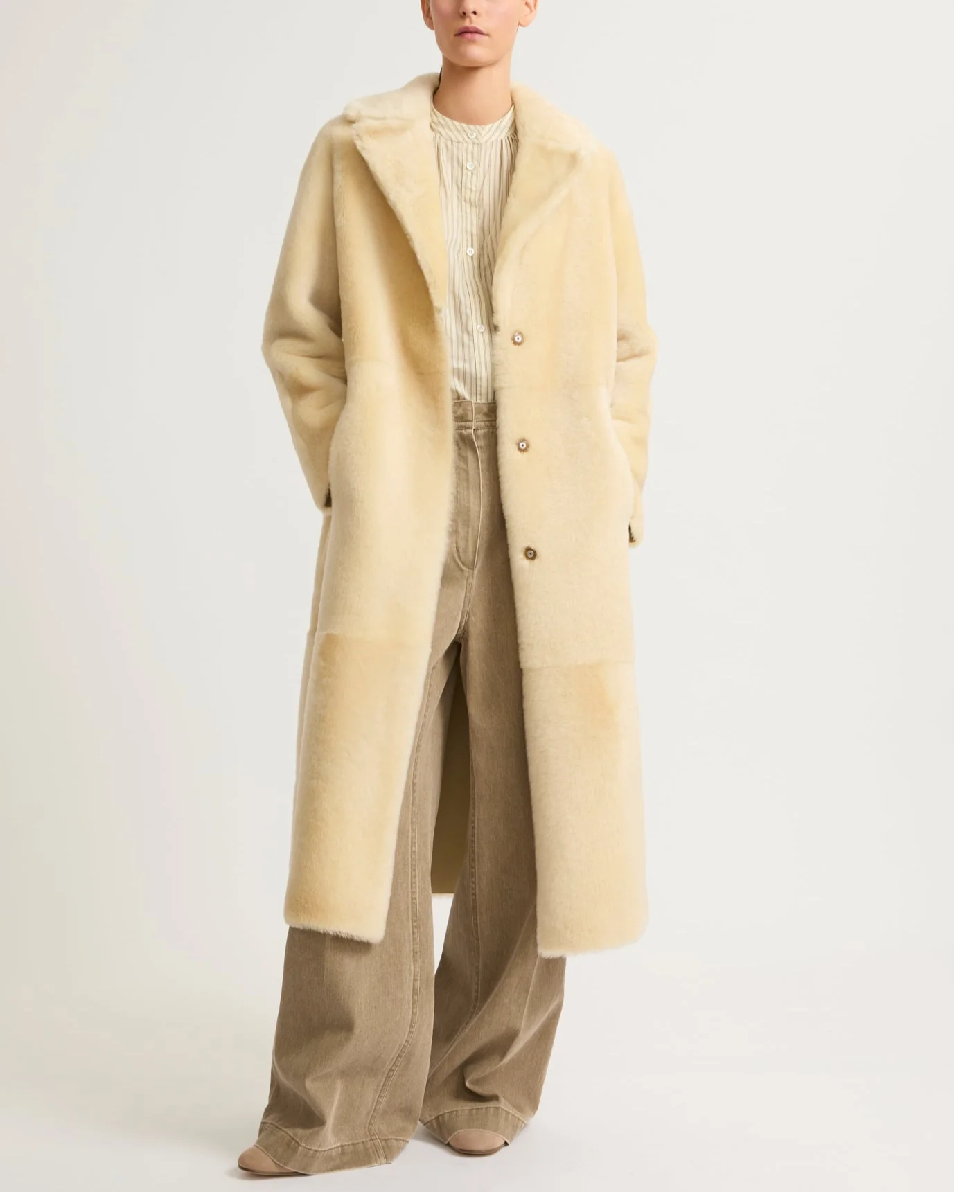 Long reversible belted shearling coat A